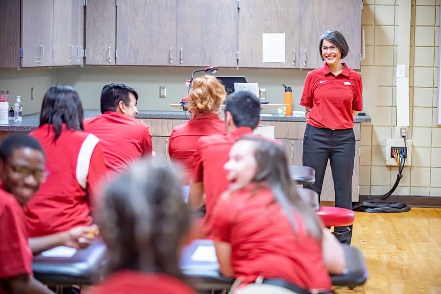 Luzita Vela, Ph.D., leads a class discussion.